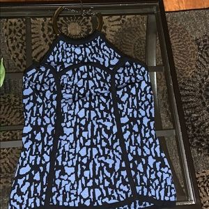 Blue and black shirt.